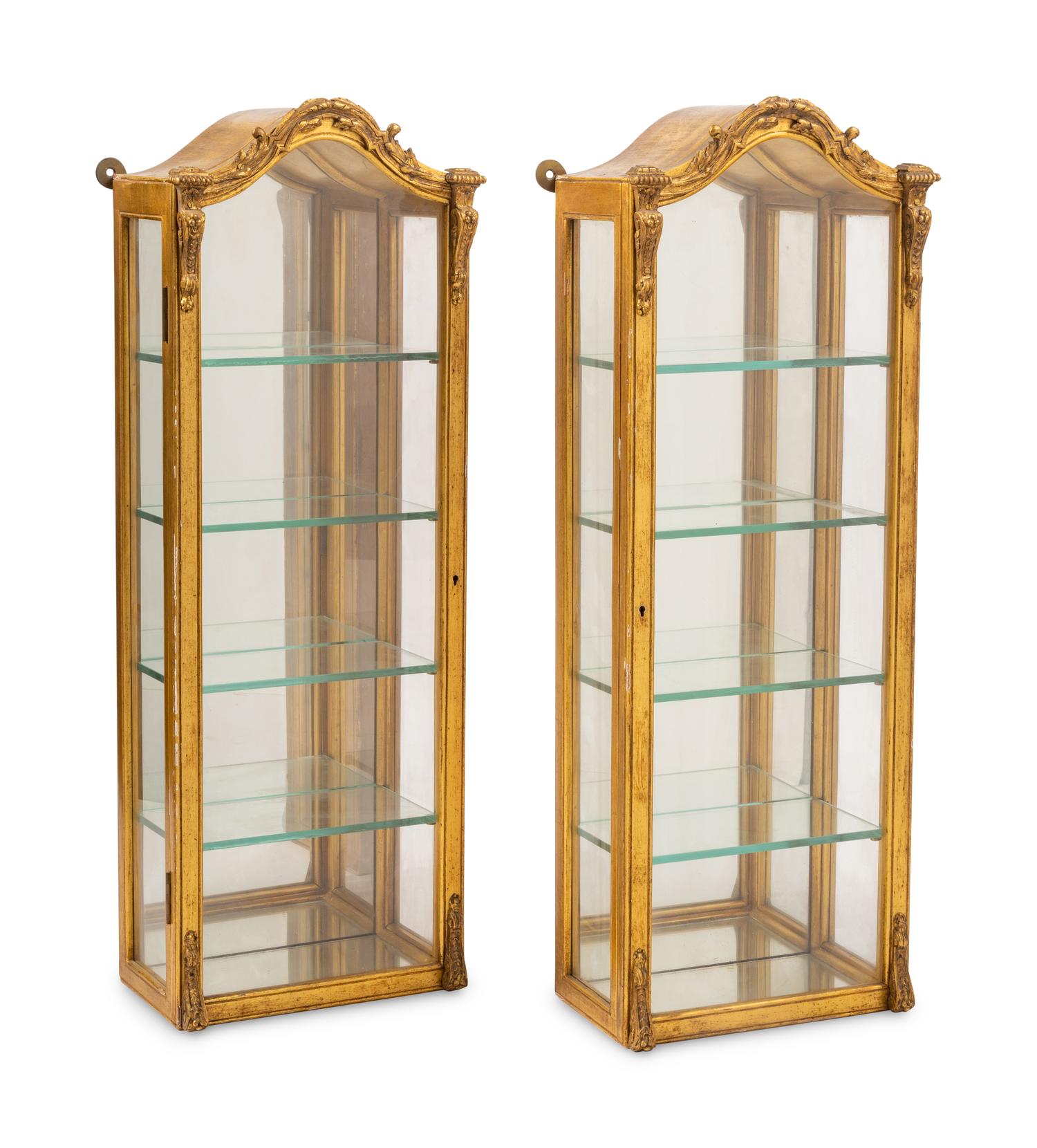 A Pair of Italian Giltwood Hanging Vitrine Cabinets