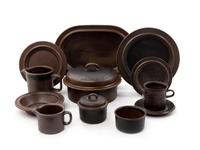 Ruska Dinnerware Set Comprising 14 Dinner Plates 11 Salad Plates 12 Desert Plates 10 Soup Bowls 10 Saucers 8 Coffee Mugs 1 Milk Pitcher 1 Lidded Tureen 1 Creamer 1 Lidded Sugar Bowl 1 Fish Platter Seventy Total Pieces Arabia, Finland glazed stoneware Length of longest 14 inches Seventy Total Pieces Arabia, Finland