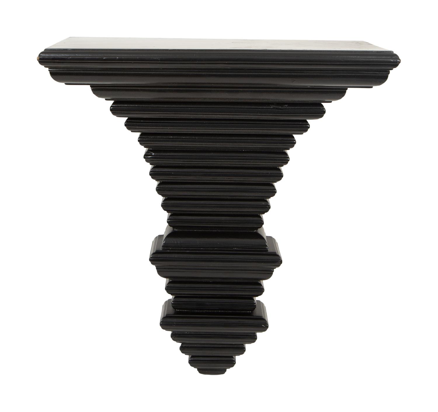 A Pair of Ebonized Wall Brackets