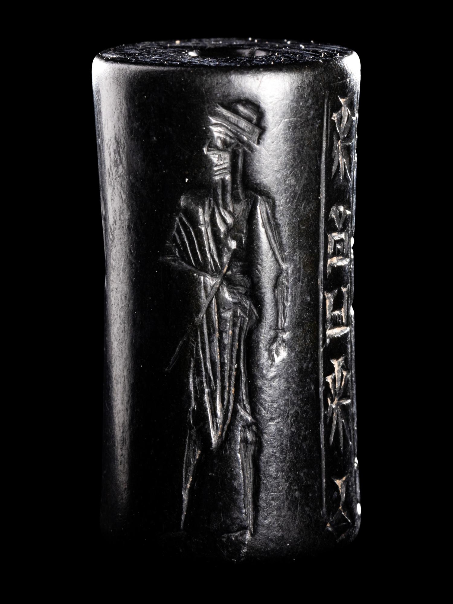 A Mesopotamian Hematite Cylinder Seal
