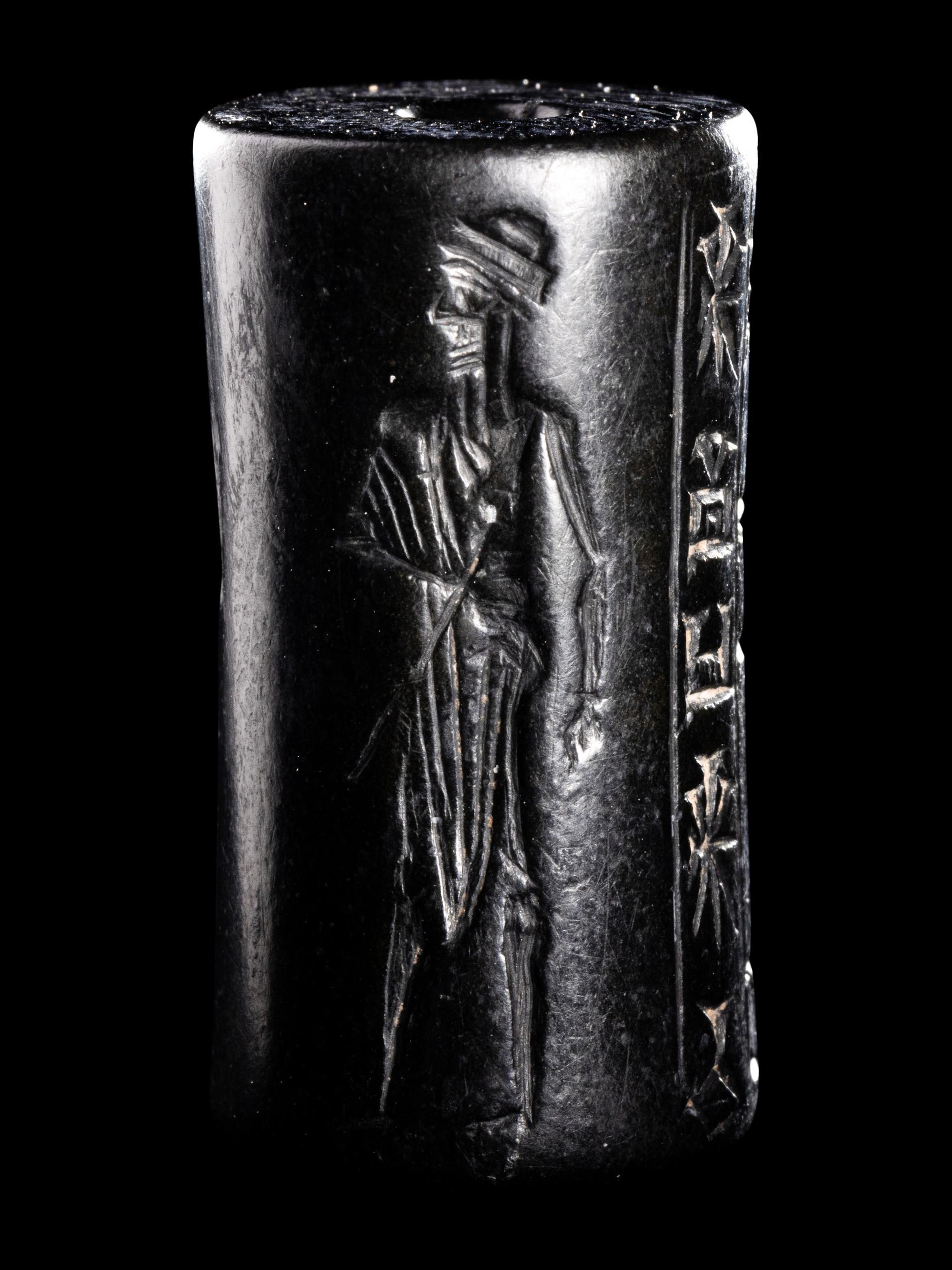 A Mesopotamian Hematite Cylinder Seal