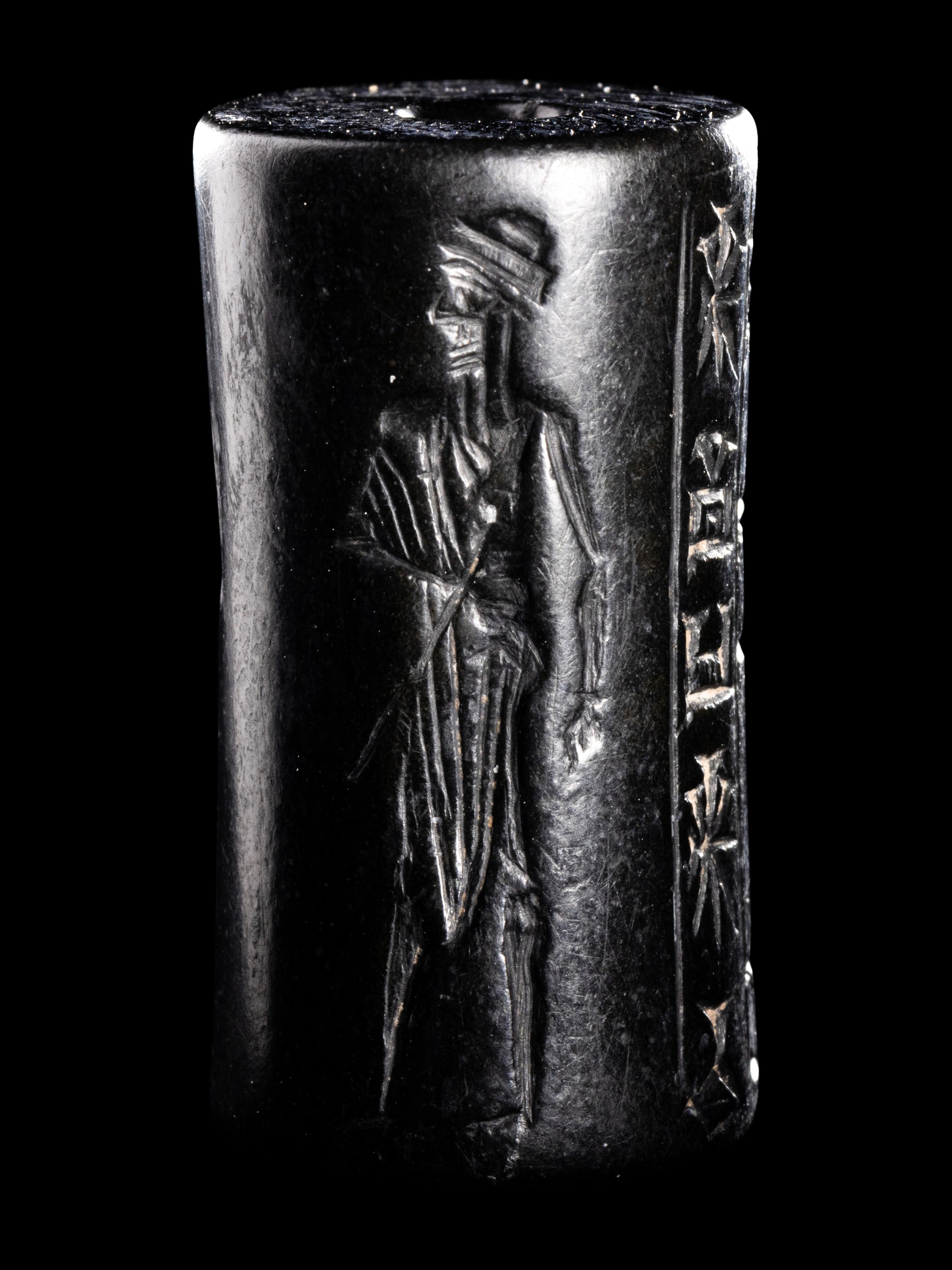A Mesopotamian Hematite Cylinder Seal