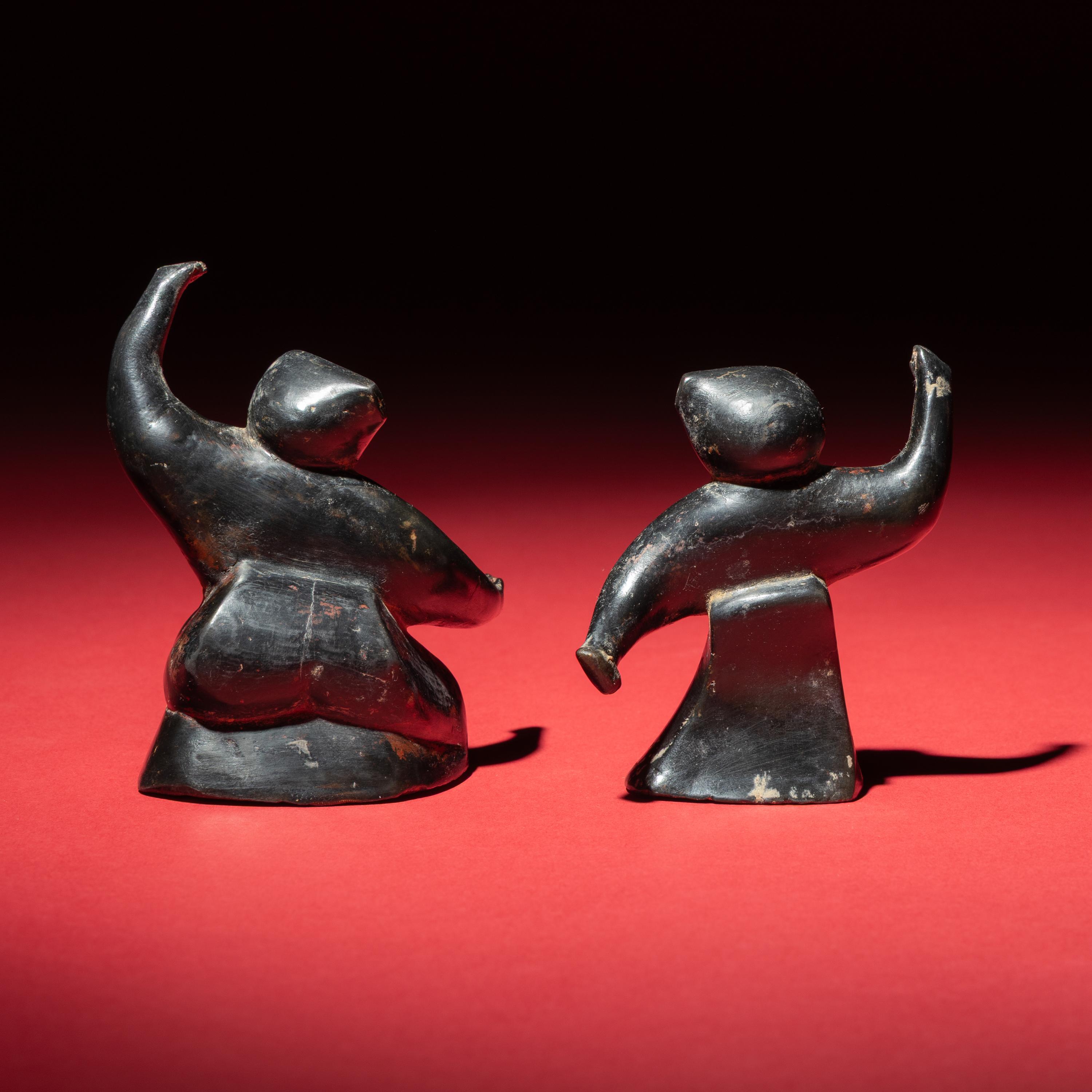 Two Chinese Black and Red Lacquered Pottery 'Dancing Figures', Warring States or Later — 戰國或以後 黑陶朱漆舞俑两只