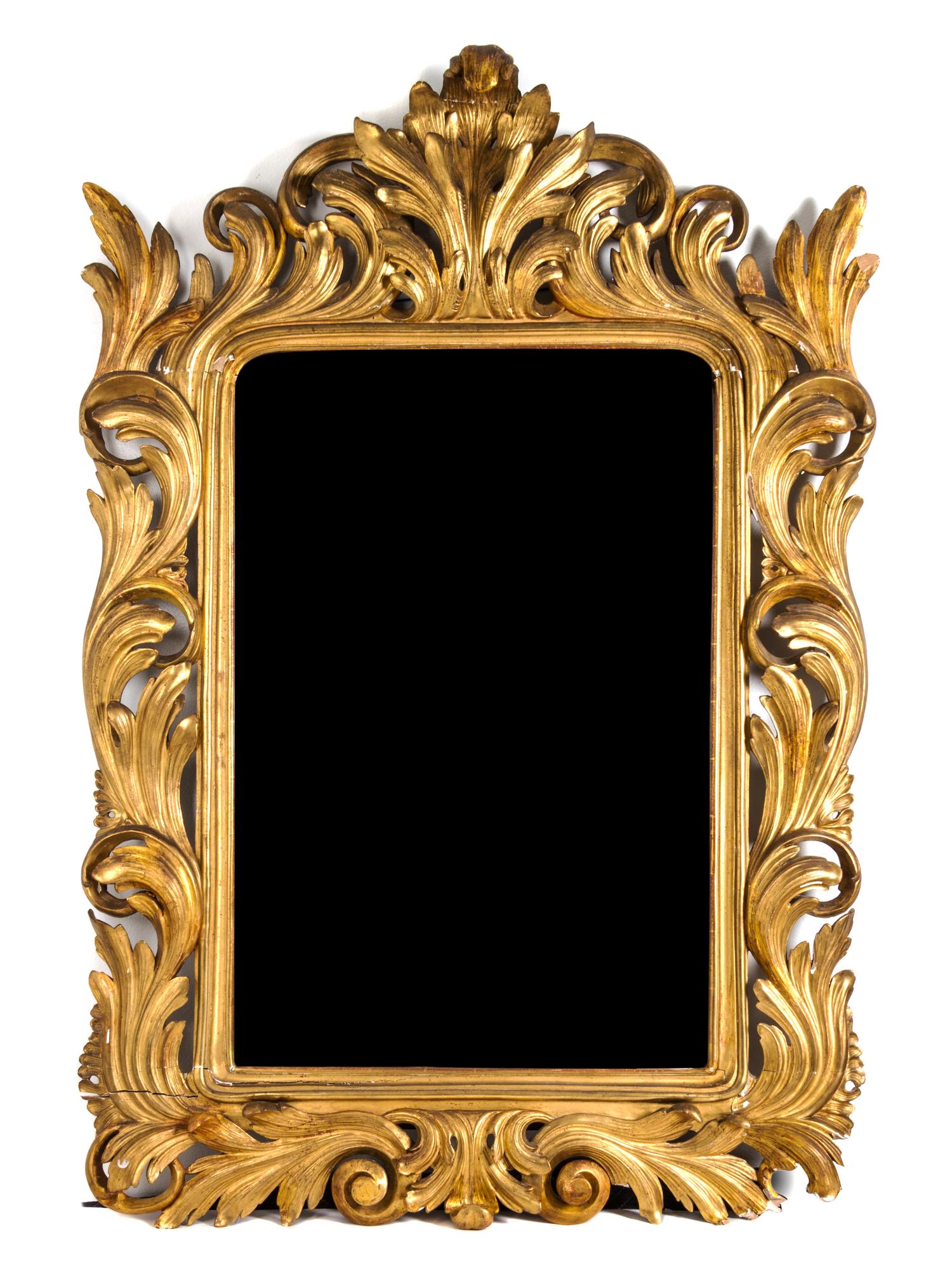 An Italian Rococo Style Giltwood Mirror Height 63 x width 44 inches. — 19TH CENTURY
