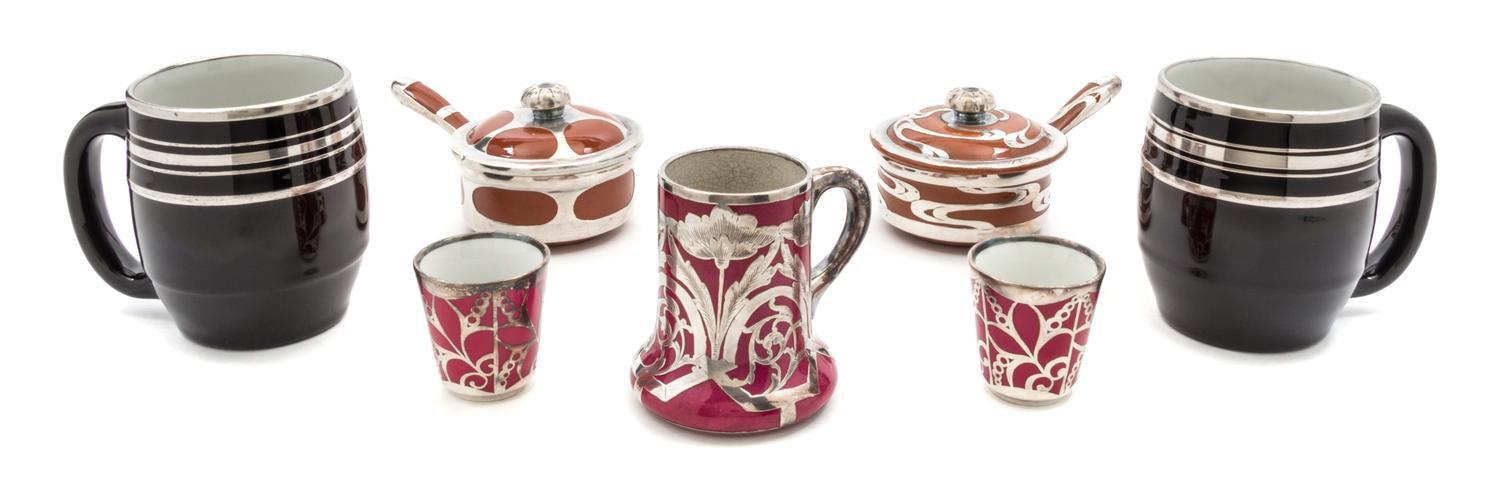 A Group of Seven Silver Overlay Table Articles Height of tallest 4 inches.