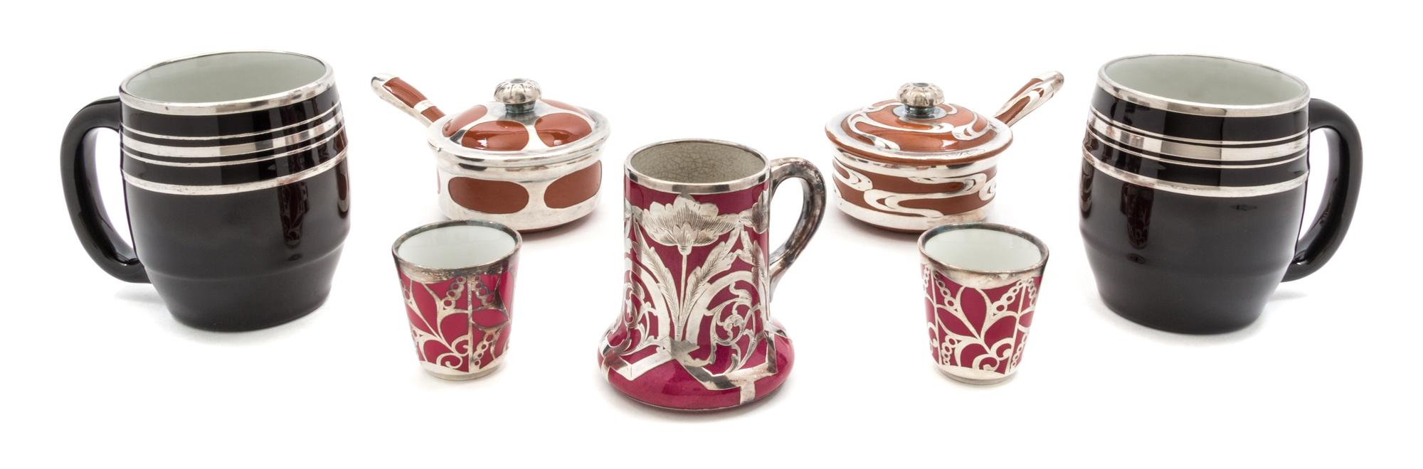 A Group of Seven Silver Overlay Table Articles Height of tallest 4 inches.