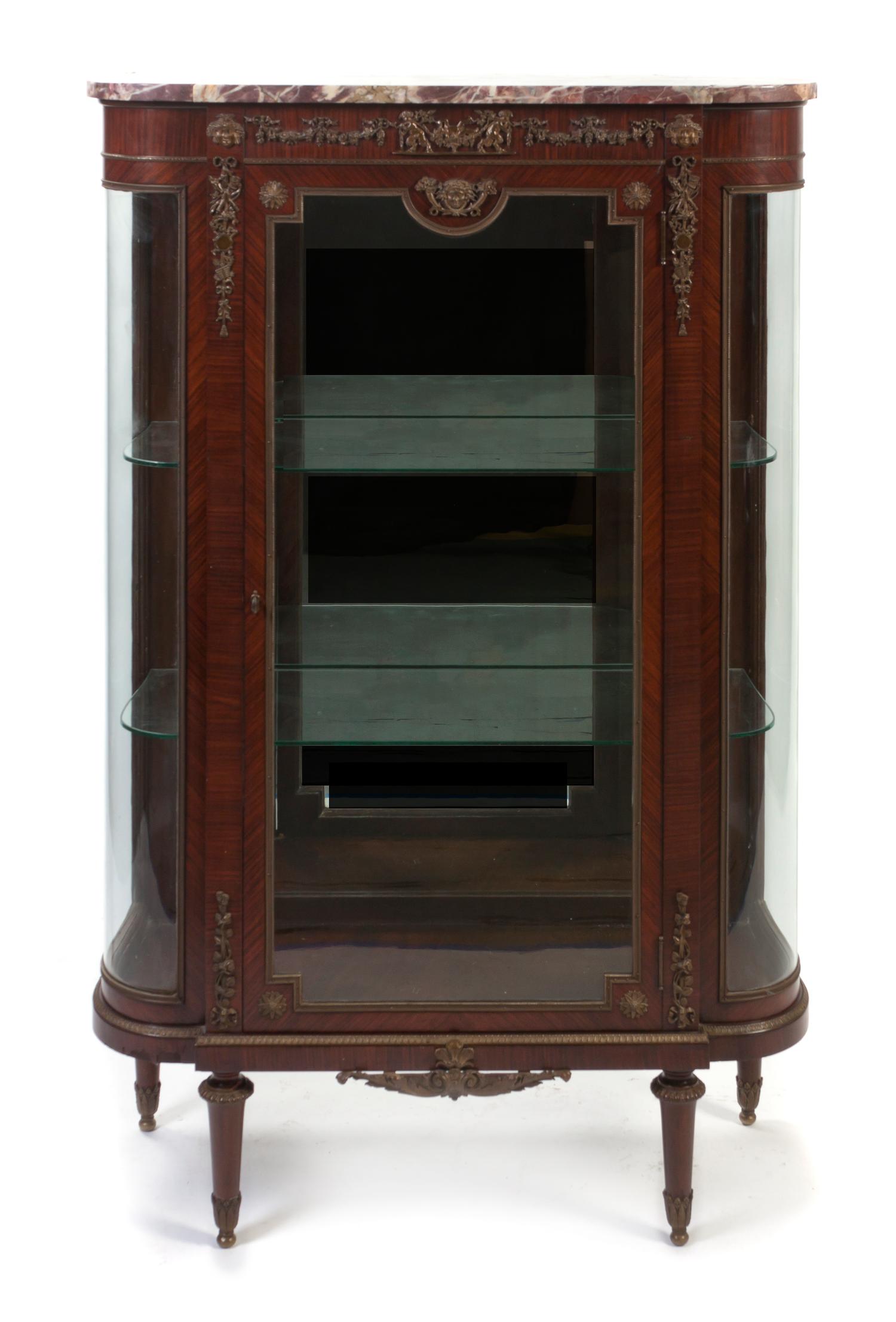 A Louis XVI Style Gilt Metal Mounted Kingwood Vitrine, Height 57 1/4 x width 37 1/2 x depth 14 1/2 inches.