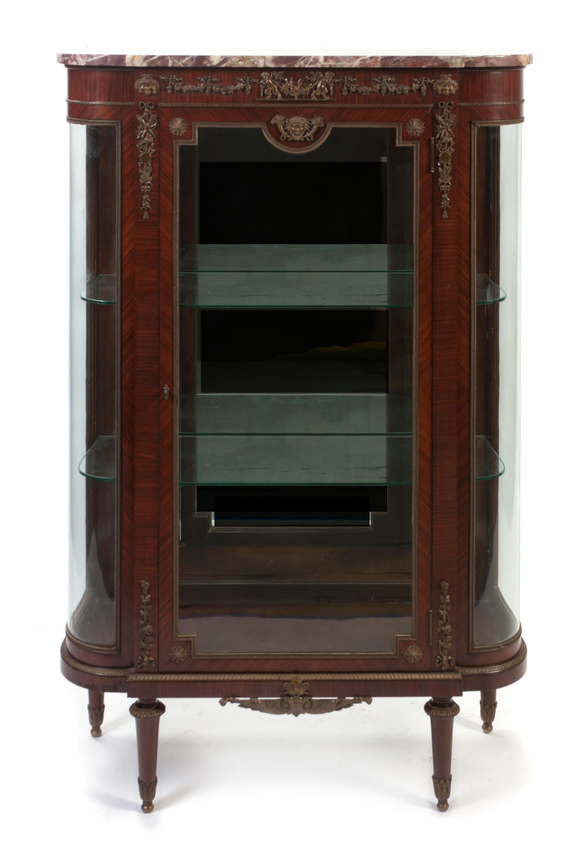 A Louis XVI Style Gilt Metal Mounted Kingwood Vitrine, Height 57 1/4 x width 37 1/2 x depth 14 1/2 inches.