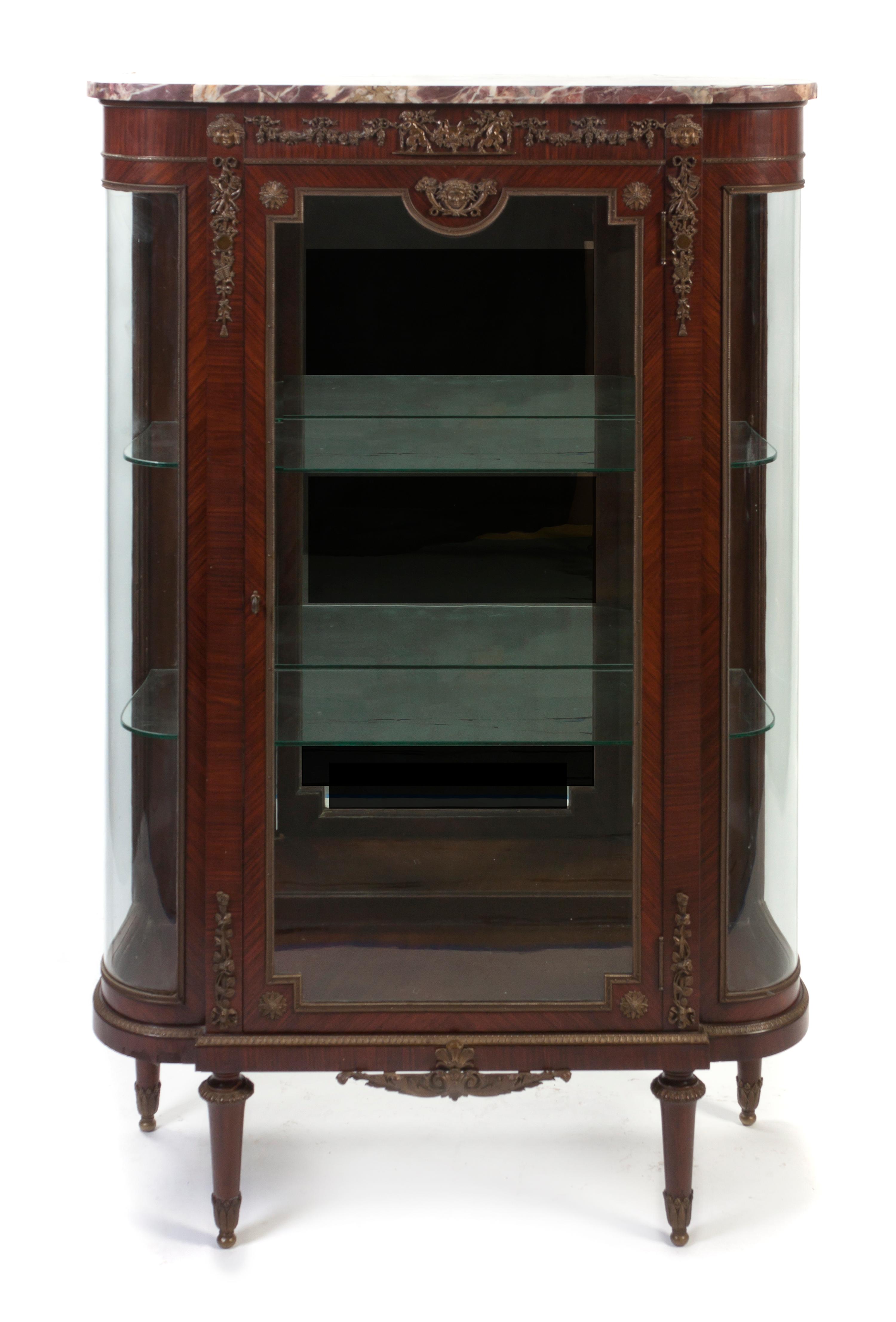 A Louis XVI Style Gilt Metal Mounted Kingwood Vitrine, Height 57 1/4 x width 37 1/2 x depth 14 1/2 inches.