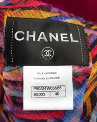 A Chanel Raspberry Wool Boucle Skirt Suit Ensemble, Size 40.