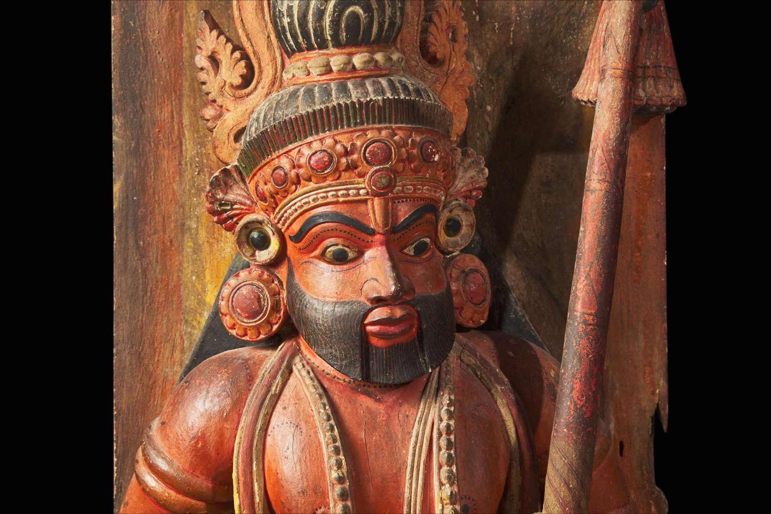 An Indian carved and painted wood figure 印度繪木神像