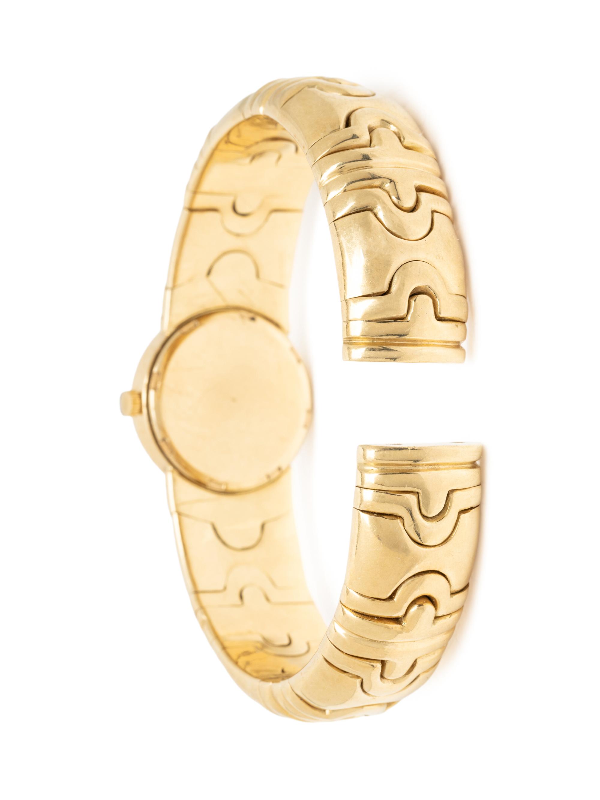 YELLOW GOLD BANGLE BRACELET WATCH