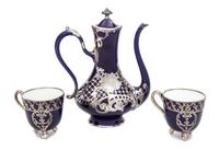 Three Porcelain Silver Overlay Tea Articles Height of first 8 1/4 inches.