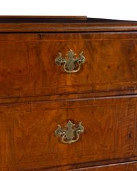 A George II Burl Walnut Chest of Drawers