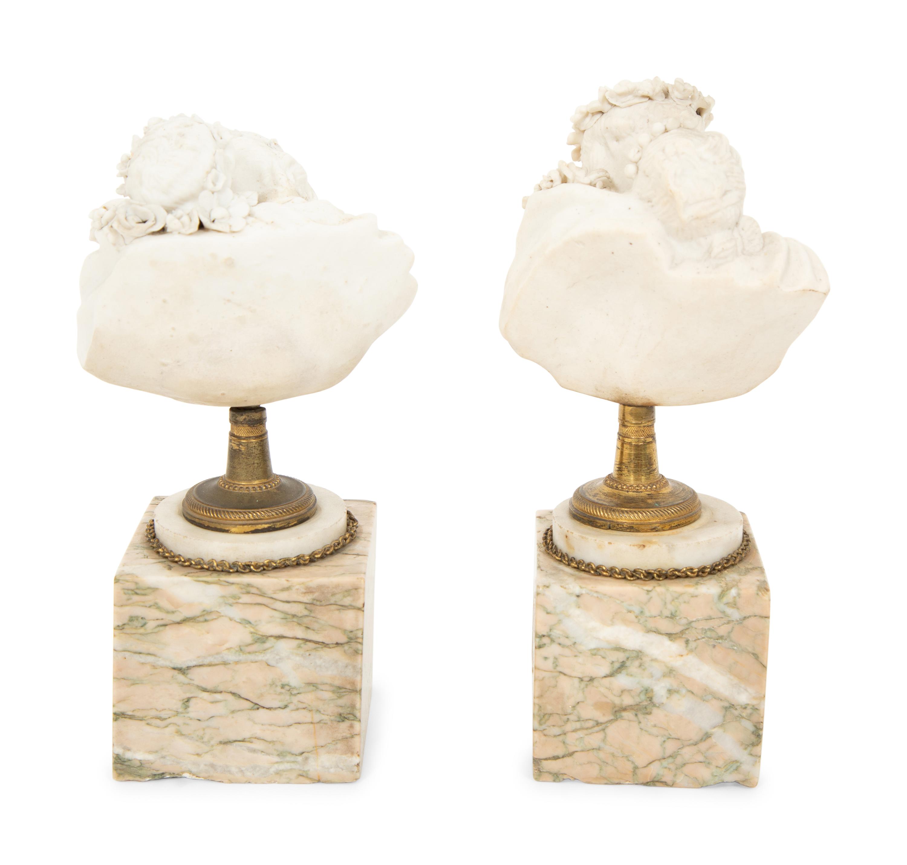 A Pair of Sèvres Style Biscuit Porcelain Bust Sculptures