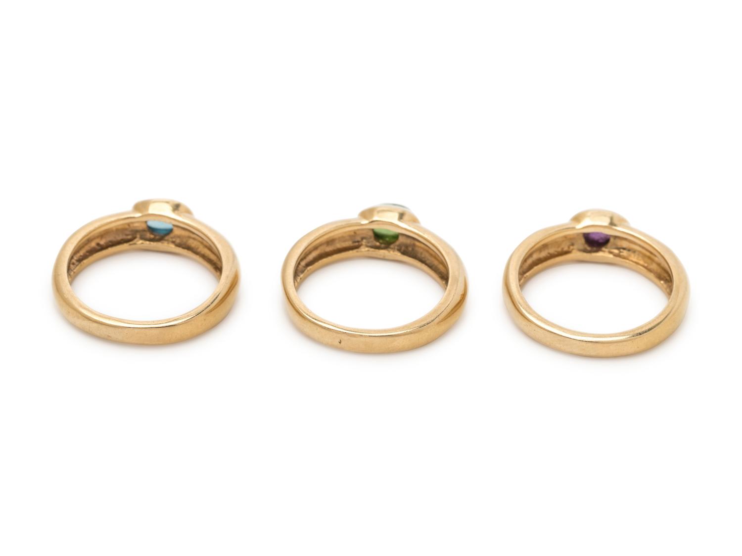 YELLOW GOLD AND GEMSTONE RING SET