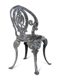 A Set of Four Wrought Iron Chairs