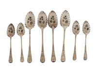 Fourteen George III Silver Berry Spoons