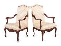 A Pair of Régence Style Walnut Armchairs