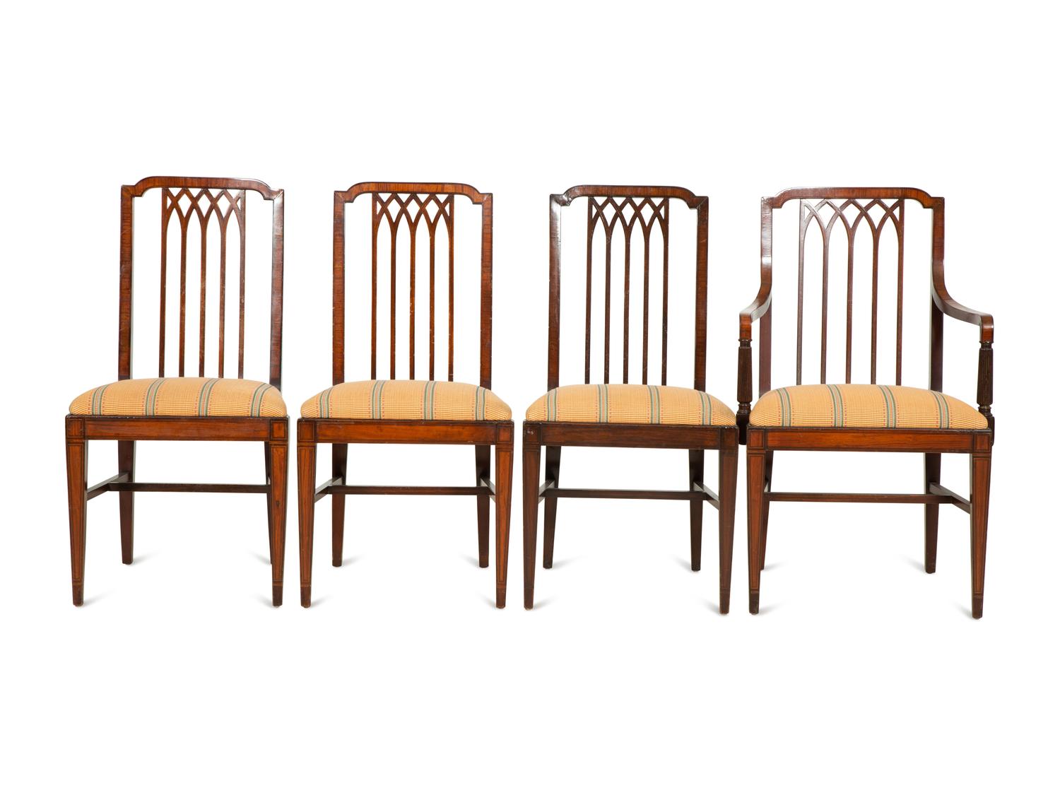 A Set of Eight George III Gothic Style Mahogany Dining Chairs
