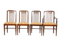 A Set of Eight George III Gothic Style Mahogany Dining Chairs
