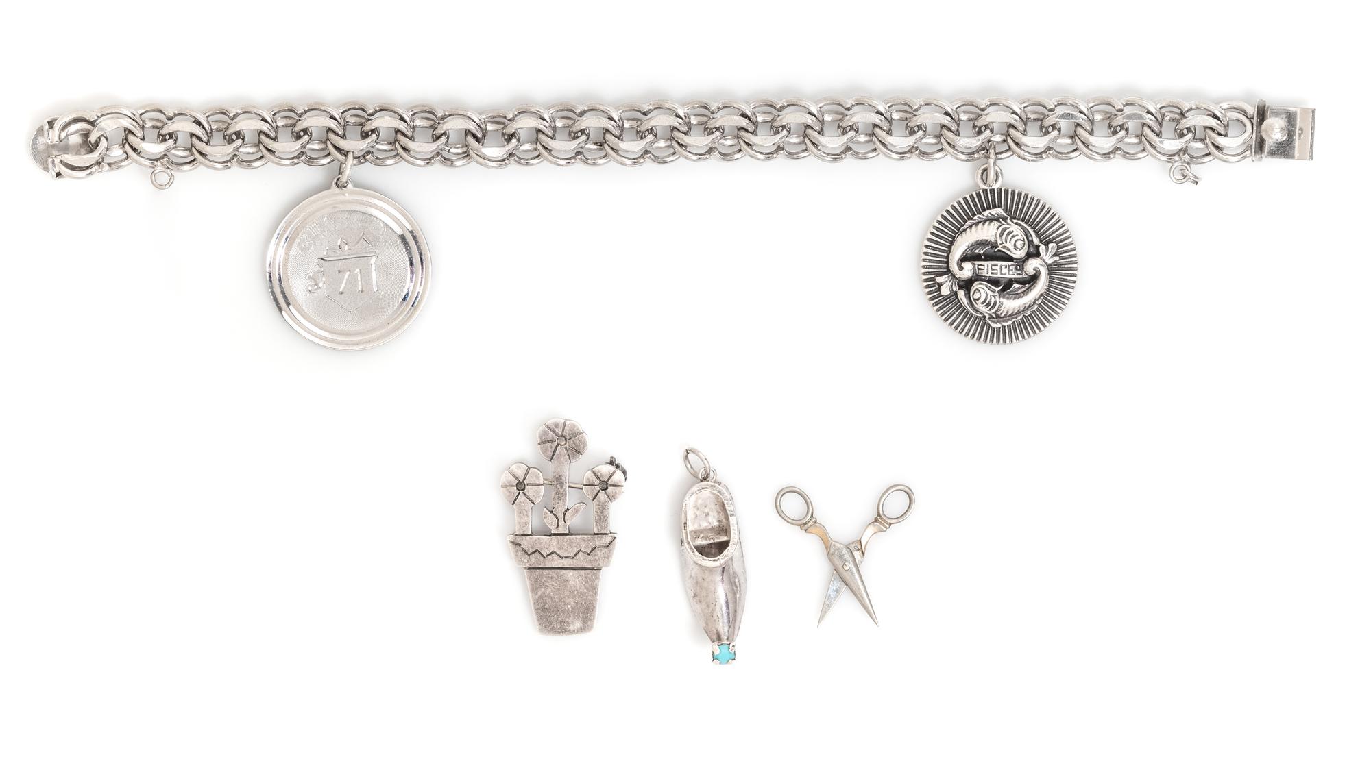 A Sterling Silver Charm Bracelet, 31.70 dwts.