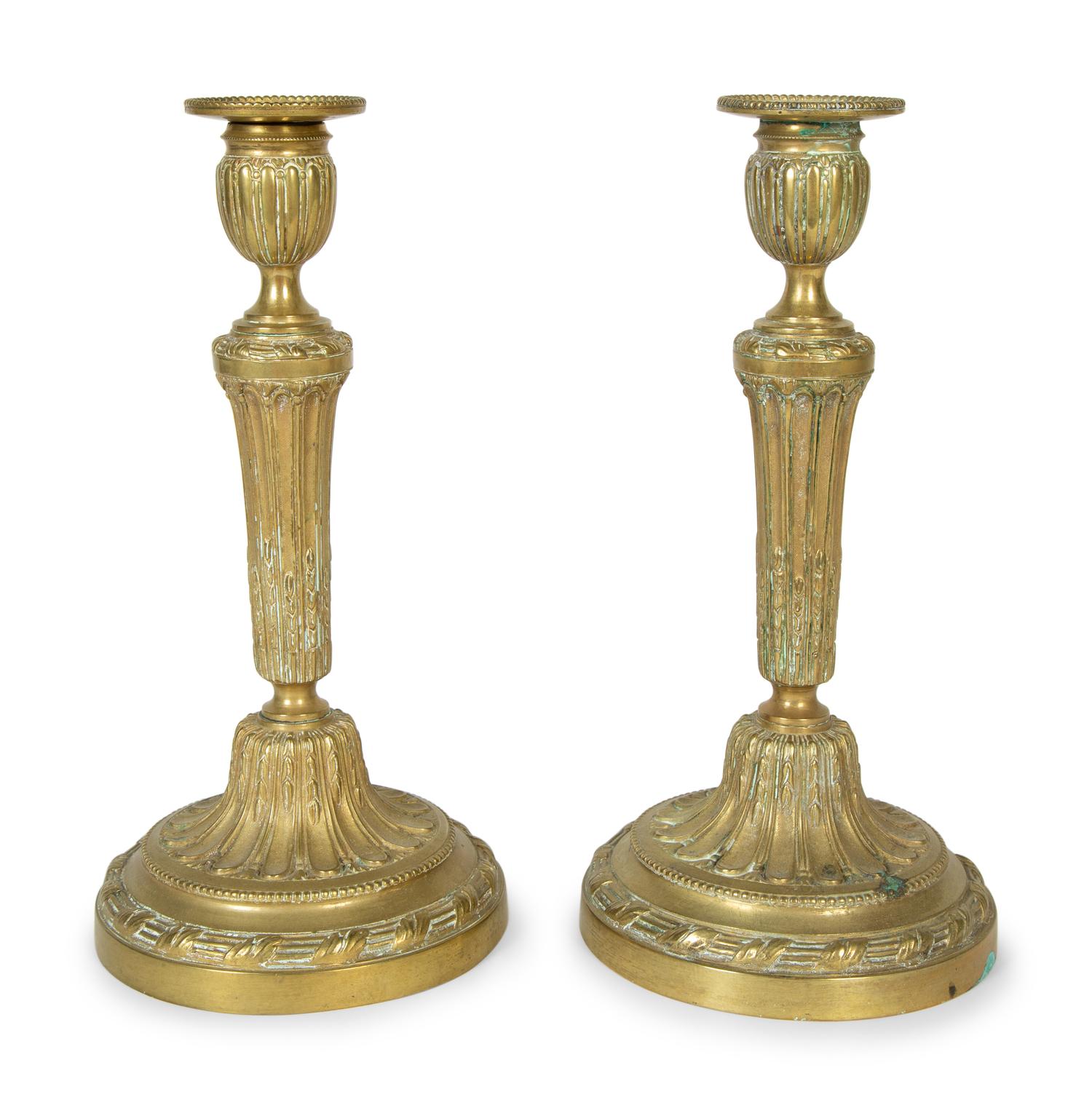 A Pair of Continental Brass Candlesticks
