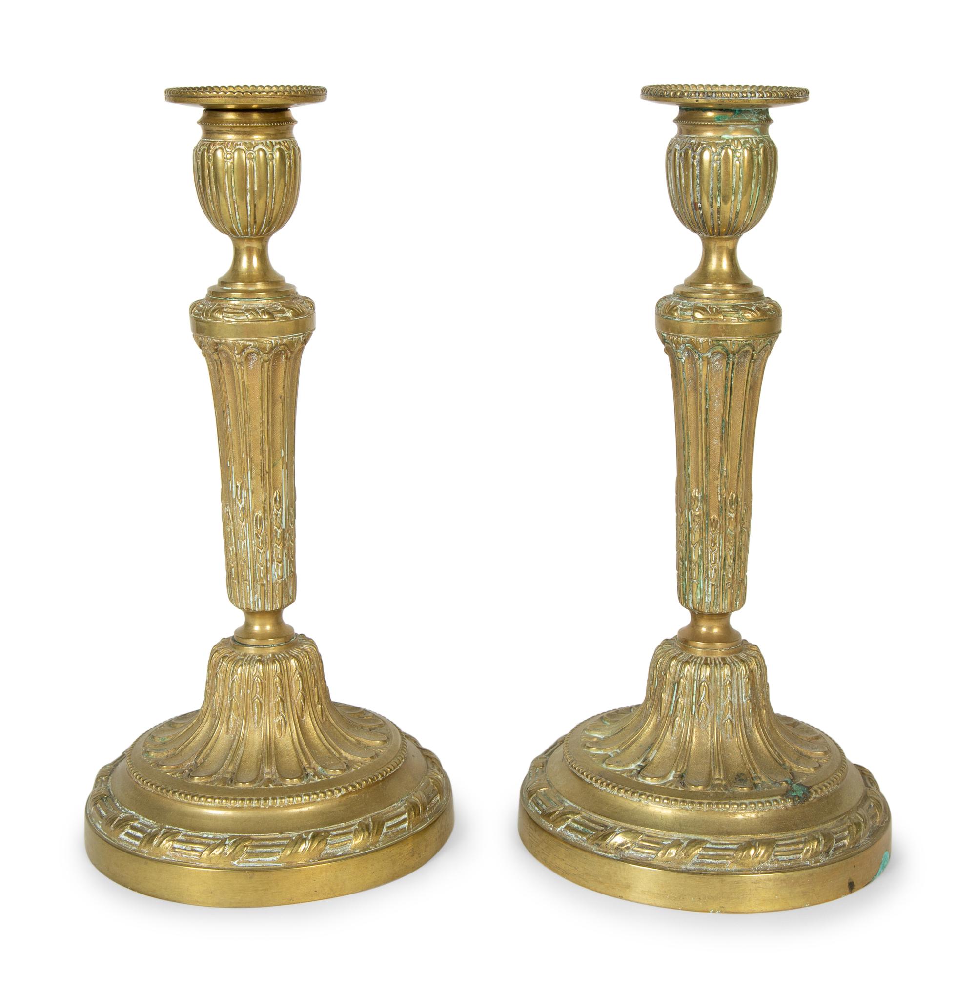 A Pair of Continental Brass Candlesticks
