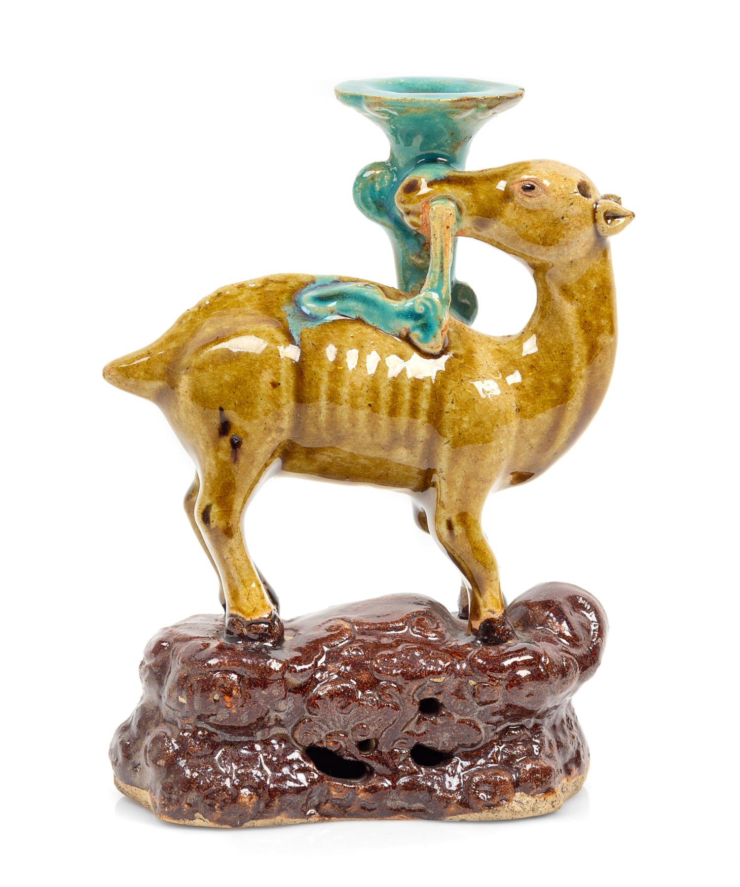 A Sancai Glazed Porcelain Candle Holder Height 6 1/2 inches. — 18TH CENTURY