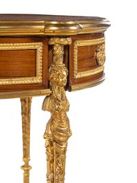 A Louis XVI Style Gilt Metal Mounted Parquetry Table