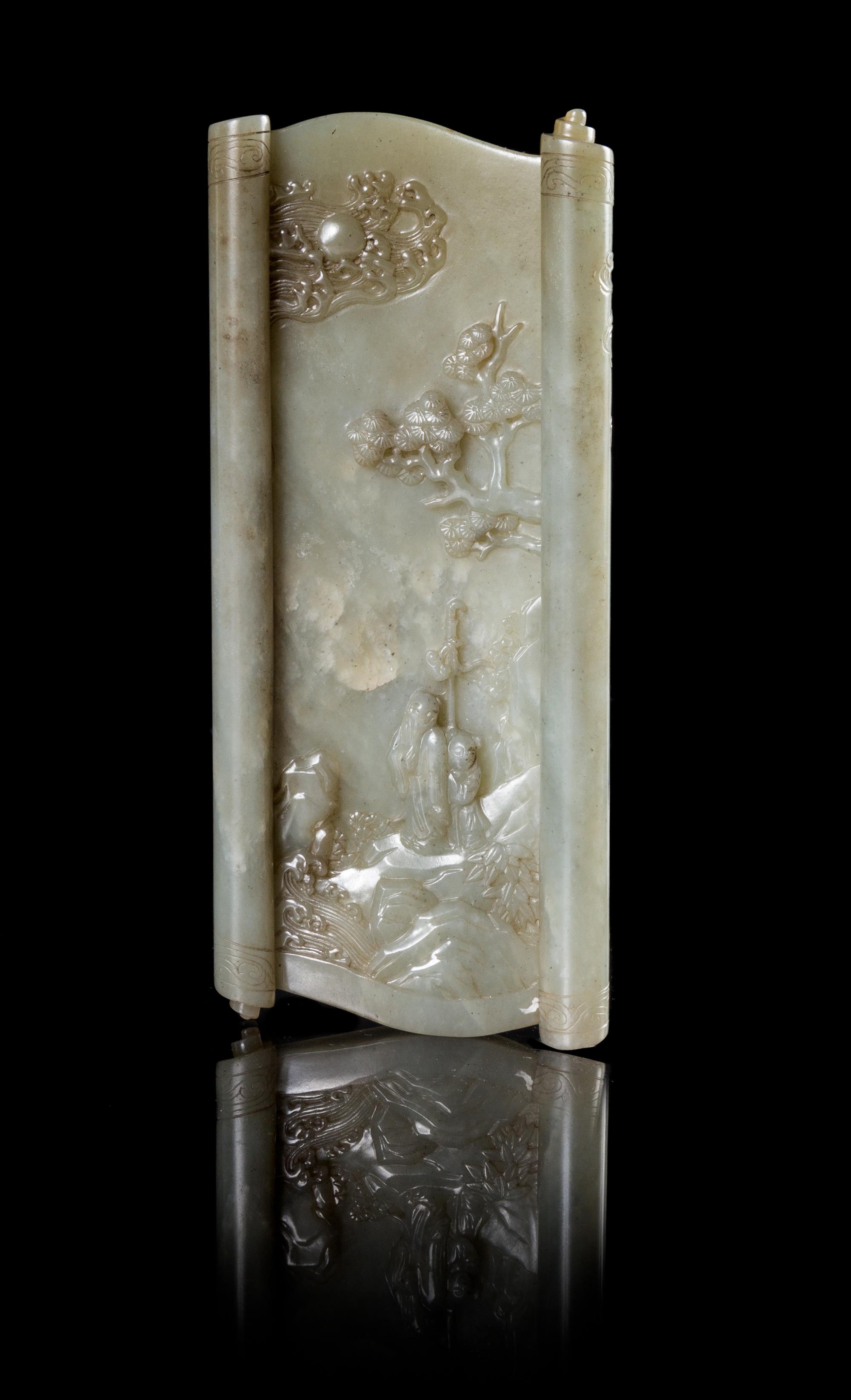 A Celadon Jade Wrist Rest Length 6 3/4 x width 2 3/4 inches.