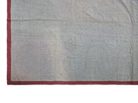 An Amish Diamond in the Square Pattern Pieced Wool Quilt