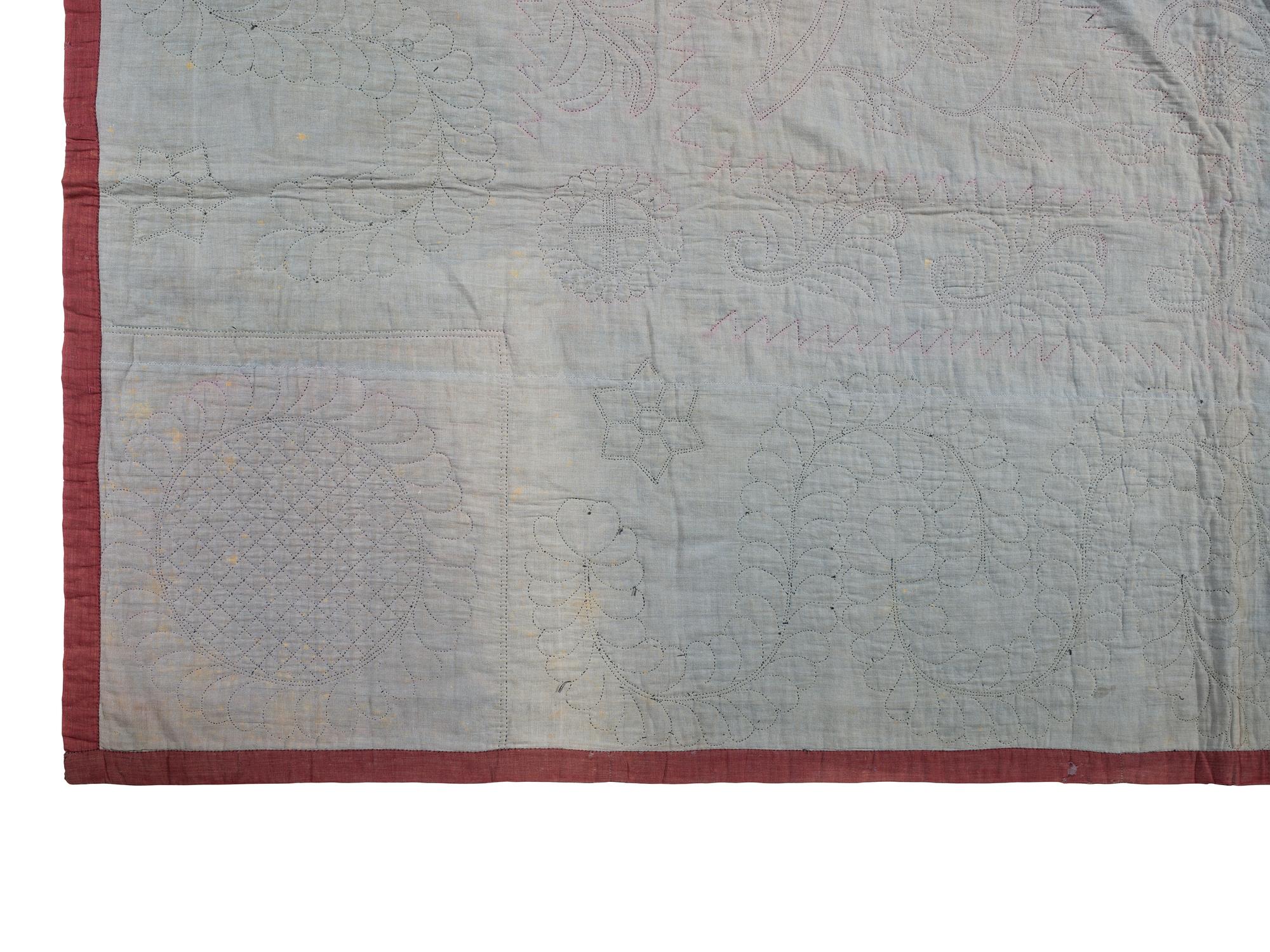 An Amish Diamond in the Square Pattern Pieced Wool Quilt
