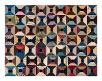 A Pieced Silk 'Courthouse Steps' Pattern Quilt