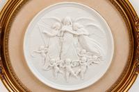 A Continental Bisque Porcelain Relief Plaque