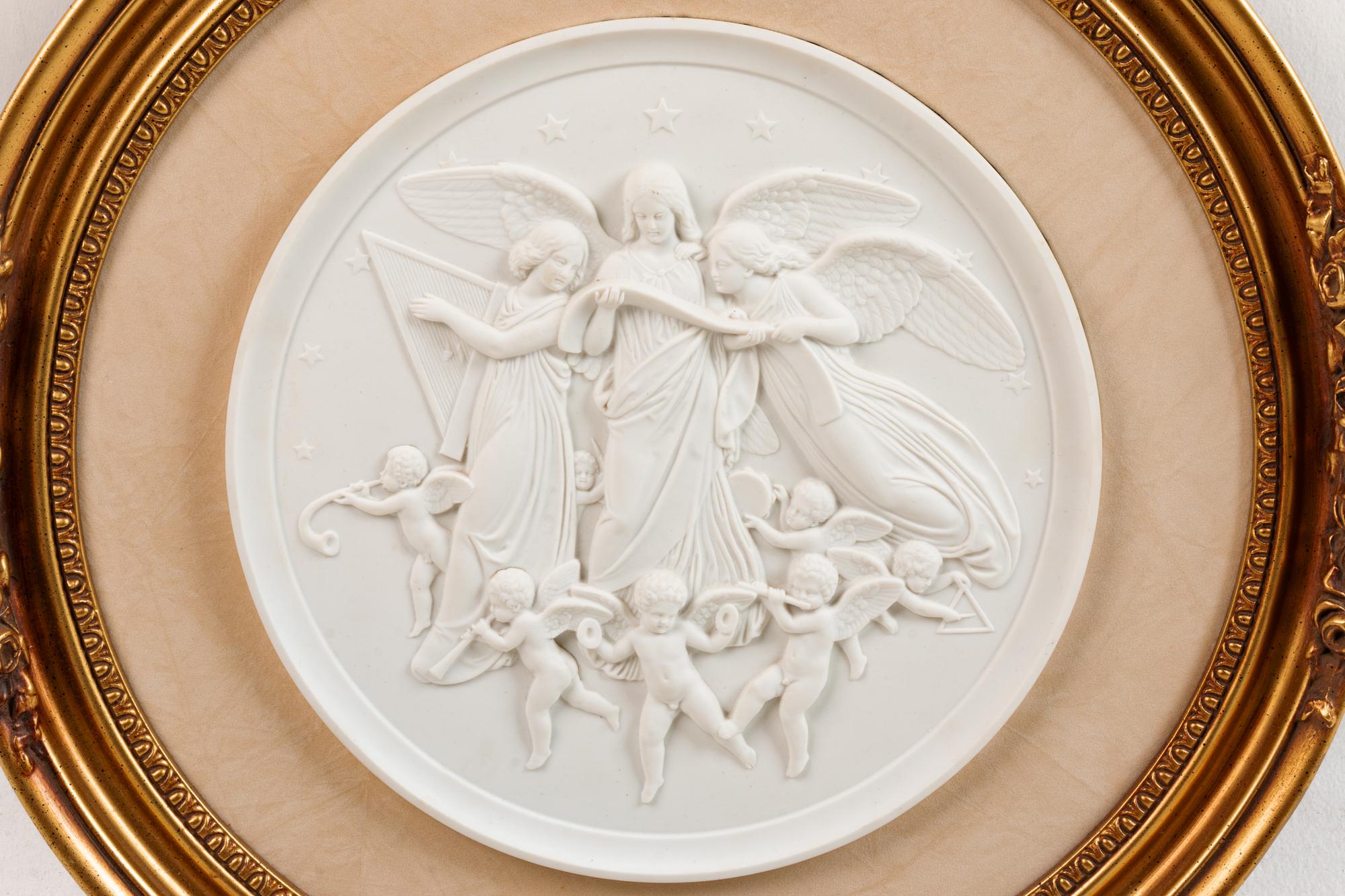A Continental Bisque Porcelain Relief Plaque