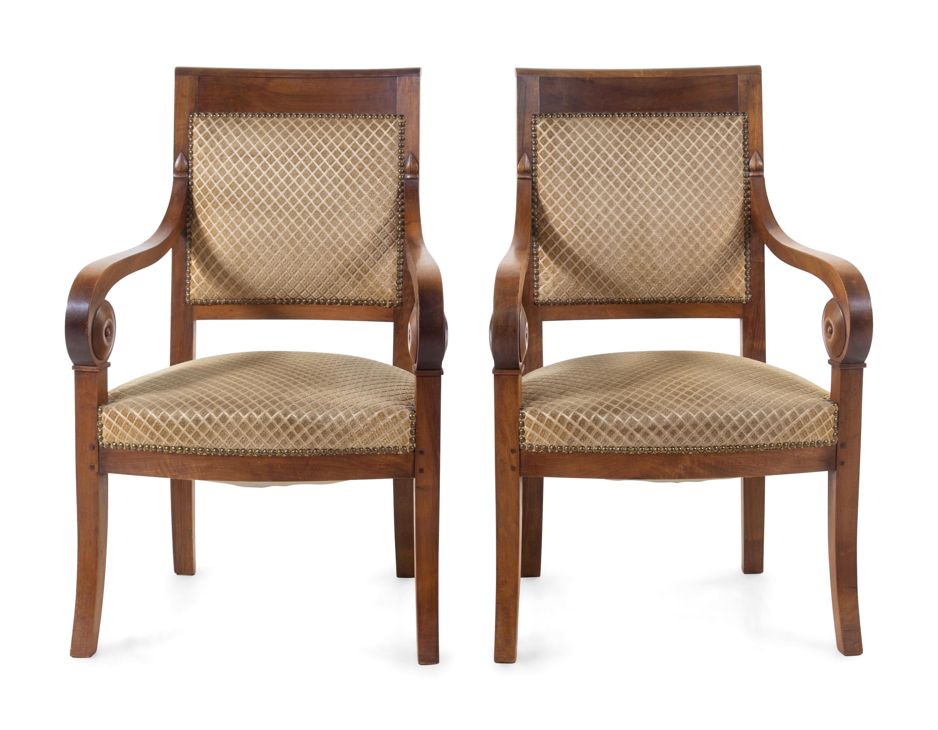 A Pair of Louis Philippe Style Walnut Fauteuils