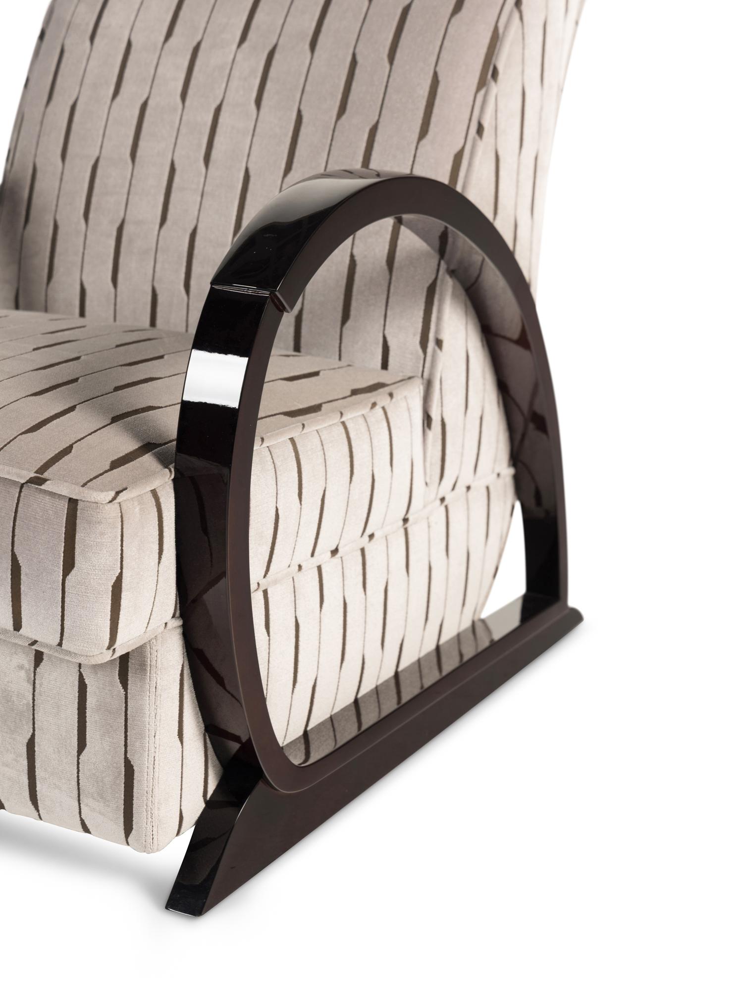 A Pair of Hugues Chevalier Sycamore Liberty Armchairs