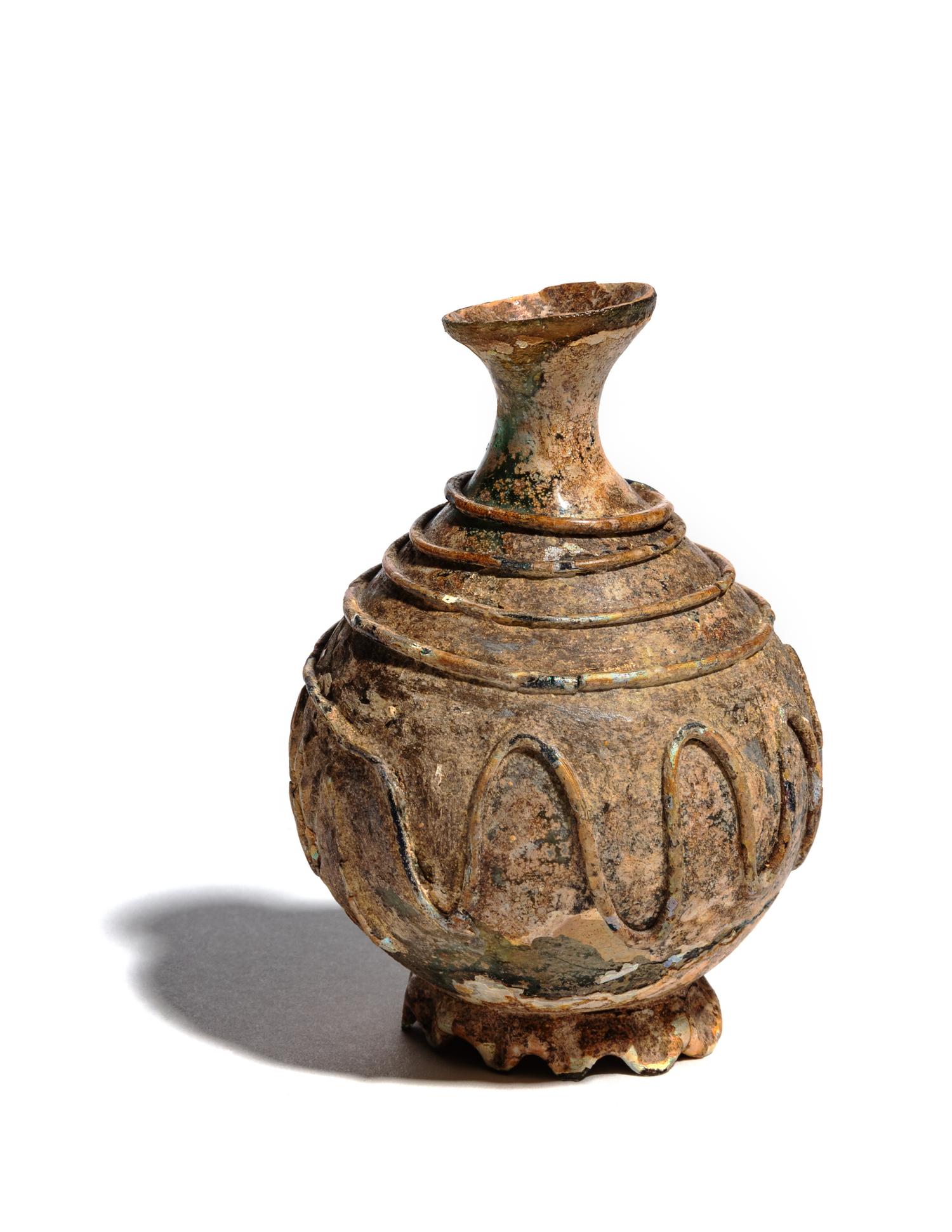A Late Roman or Islamic Glass Bottle